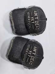 “Ain’t Dead Yet” Distressed Washed Black Baseball Cap | Embroidered Dad Hat
