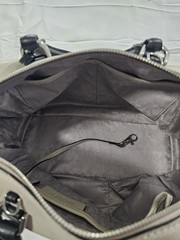 Michael Kors Kirby Large Leather Satchel feature Black Handles And Silver Logo