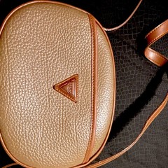 GUESS Pebbled Tan Brown Oval Crossbody Bag Zip Top Adjustable Strap Pockets