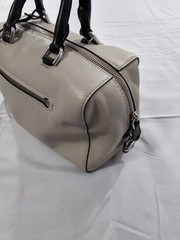 Michael Kors Kirby Large Leather Satchel feature Black Handles And Silver Logo