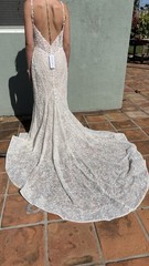 Atelier House Ivory Lace Fit and Flare Wedding Dress Plunging Neckline Train