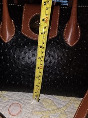 Dooney and Bourke Ostrich Turnlock Flap Handle Tote Black with Brown Trim