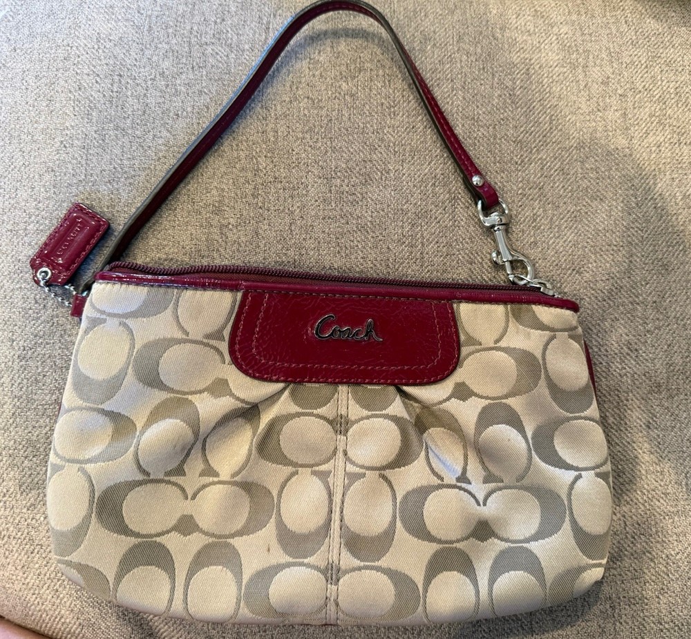 COACH Wristlet Signature C Garnet And Beige