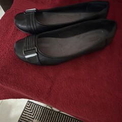 Women’s Black Slip-On Flats with Buckle Accent and Round Toe
