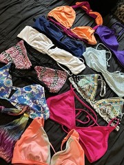 ~ Lululemon orange-ish pink bikini top with cross black and frills on the straps